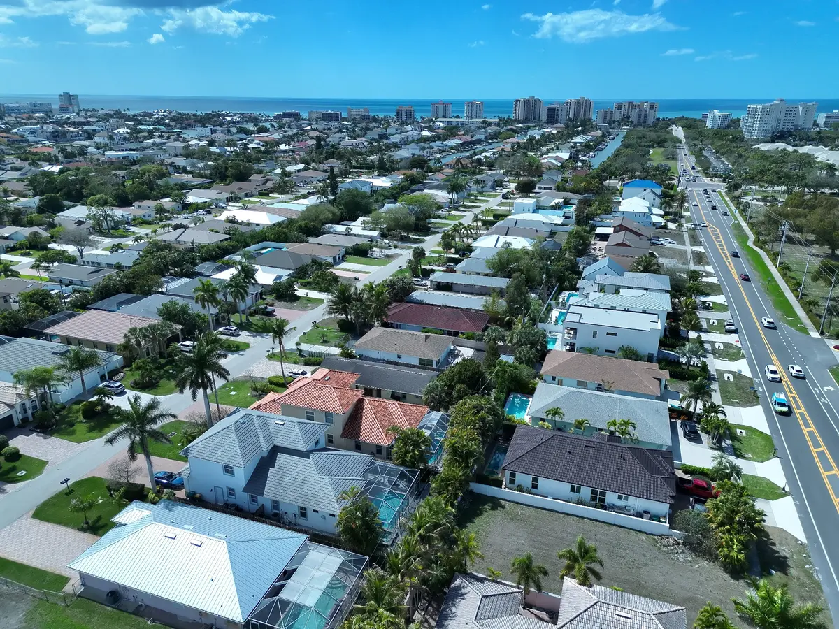 Aerial view of a Southwest Florida residential neighborhood with coastal context